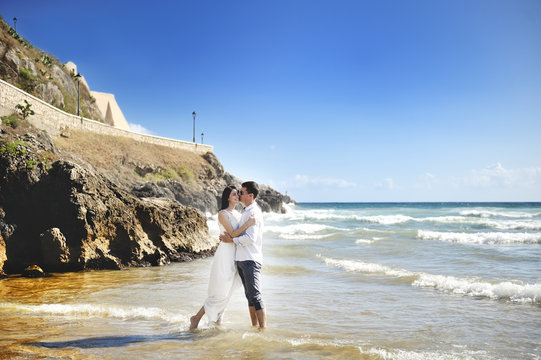 beautiful couple together on the beach, Sperlonga, Italy