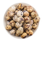 Quail eggs in a white bowl over white background 
