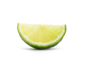 slice of lime over white background