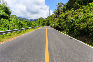 Fototapeta na wymiar Clean road on the hill in Phuket, Thailand