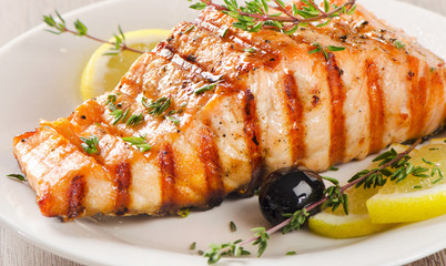 Grilled Salmon with lemon, olives and fresh herbs