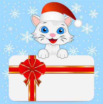 merry kitten in a christmas cap and greeting-card