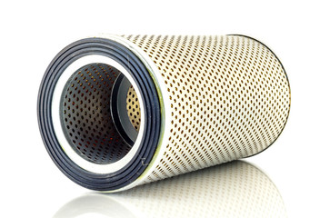 Element return filter is a device for car isolated on white background and there is a reflection on the white ground.