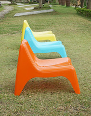 three plastic chair in garden