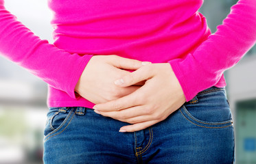 Woman with stomach issues