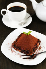 Yummy chocolate cupcake on table