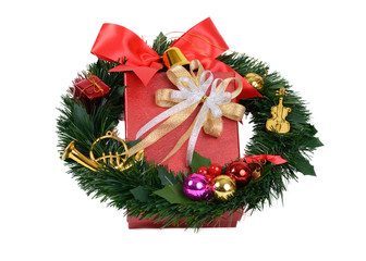 Red gift box with Christmas wreath.