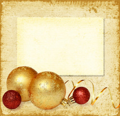 Yellow and red balls with golden ribbon