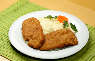 Fried steak with mashed potatoes on plate