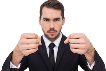Exasperated businessman with clenched fists