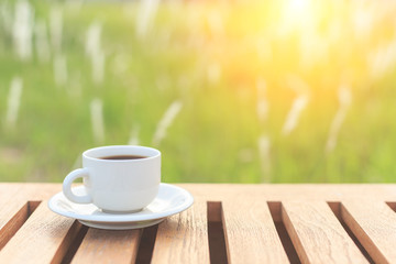 Coffee cup on the table in the morning