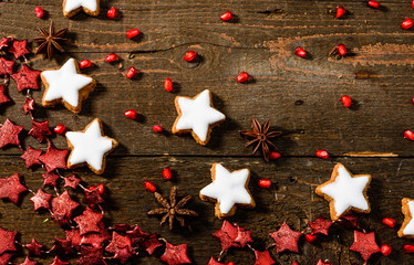 Texture on wooden background with Christmas cookies
