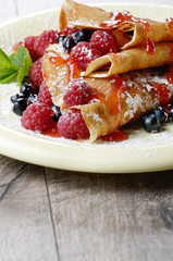 Crepes raspberry blueberries mint