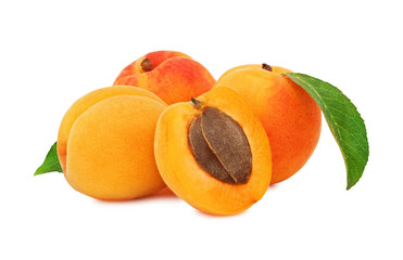 Three whole and a half apricots with green leaves (isolated)