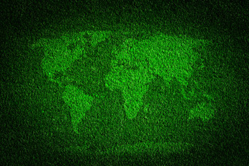 World map on green grass field background