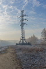 High voltage tower winter morning