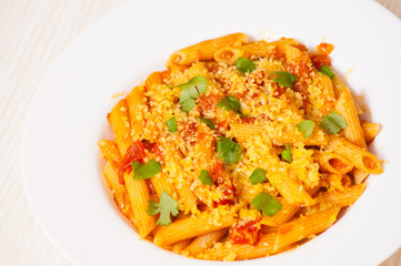 Penne rigate pasta with tomato sauce