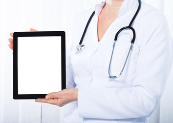 Doctor holding digital display and makes patient diagnosis