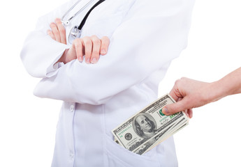 Patient bribing doctor, putting cash to pocket.