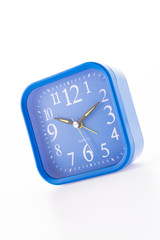 Blue clock isolated on white background