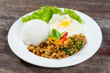 Rice topped with stir fried minced pork and basil