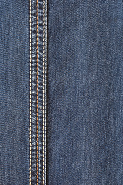 Denim with a seam in the background