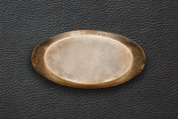 A metal plate on a background of the skin