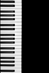 Fototapeta na wymiar Piano keys on a black background