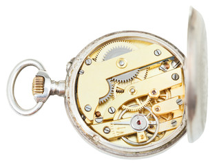 above view of brass clockwork retro silver watch