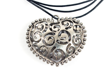 Silver heart pendant necklace on white