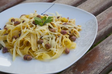Italian pasta with pistachio pesto and parmesan