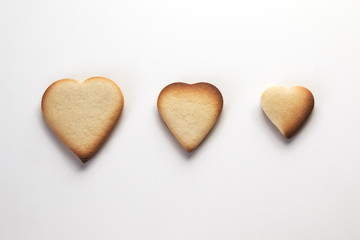 Three hearts cookies on white backgound