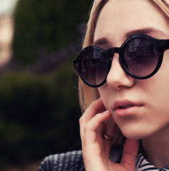 Beautiful girl in sunglasses