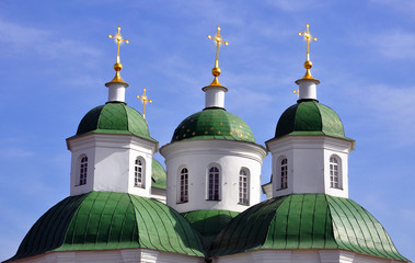Fototapeta na wymiar domes of orthodox church against the sky