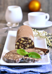 Chocolate salami with biscuits.