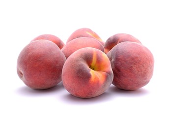 Ripe peaches fruit isolated on white background