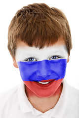 Young boy with Netherlands flag painted on his face