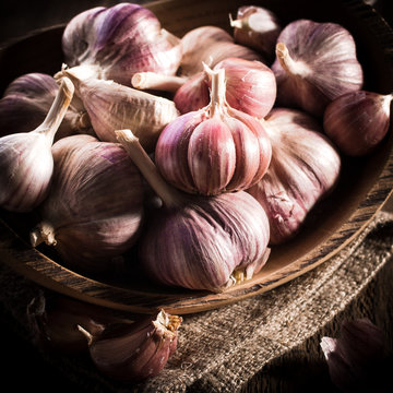 garlic bulb on rustic wooden background