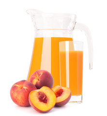 Peach fruit juice in glass jug