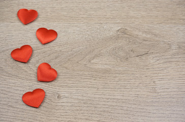 Hearts on the wooden background