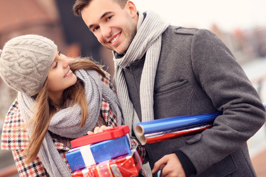 Beautiful couple on Christmas shopping