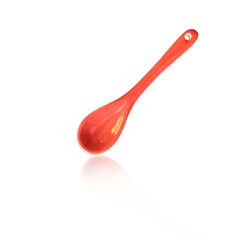 Ceramic spoon isolated on white background