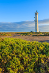 Fototapeta na wymiar Lighthouse on Morro Jable beach, Fuerteventura, Canary Islands