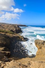 Fototapeta na wymiar La Pared beach and ocean bay on coast of Fuerteventura island
