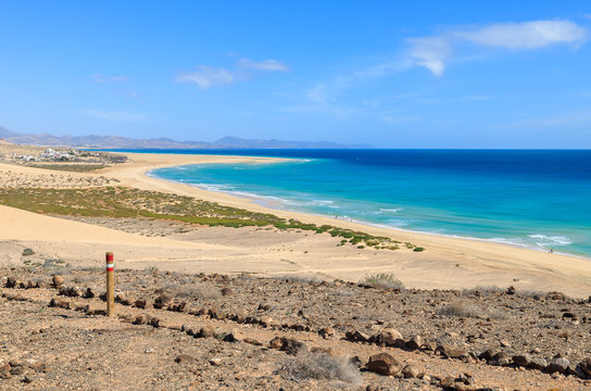 Trekking path and view of Sotavento beach, Fuerteventura island