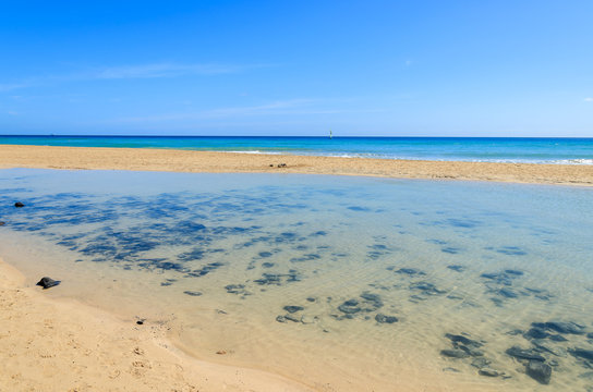 Crystal clear water at beach lagoon, Morro Jable, Fuerteventura