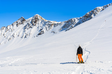 Naklejka na ściany i meble Skier in winter mountain resort of Pitztal, Austrian Alps