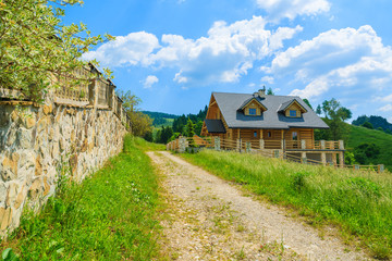 Wooden mountain house on sunny summer day, Pieniny, Poland - obrazy, fototapety, plakaty
