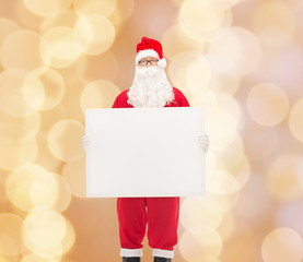 man in costume of santa claus with billboard