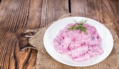 Portion of Herring Salad (with beet)